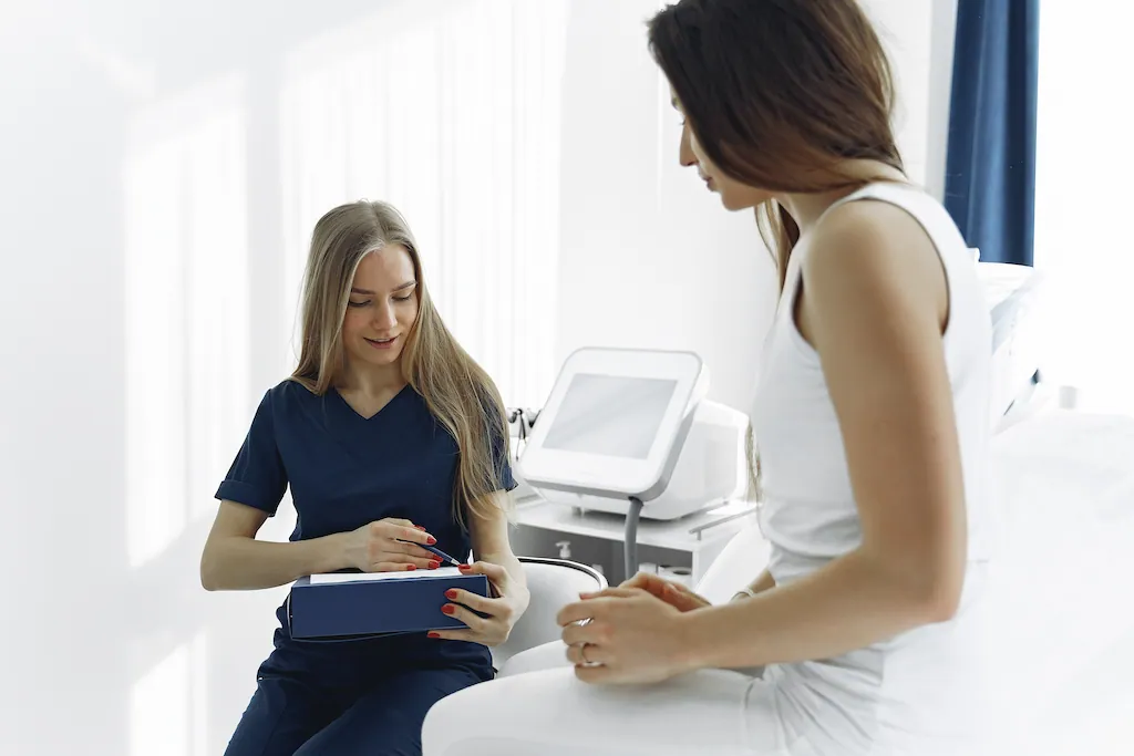 Woman Talking To The Sick Patient