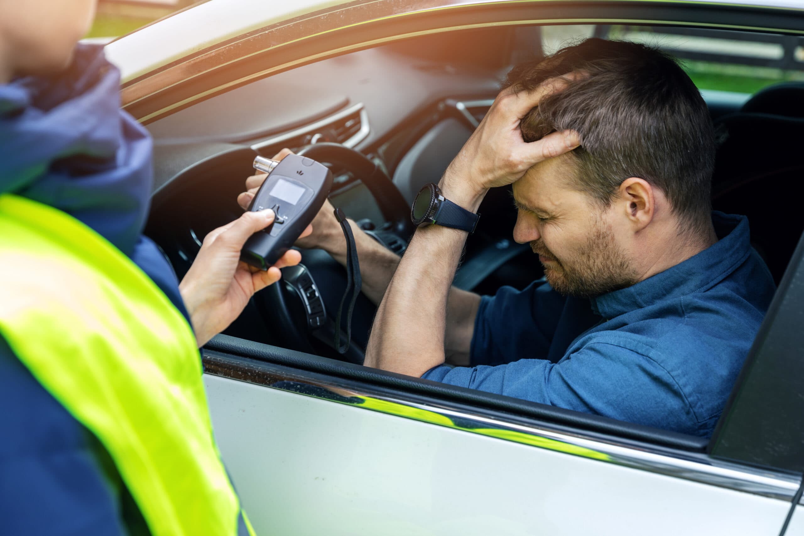 man caught drunk driving dui breathalyzer