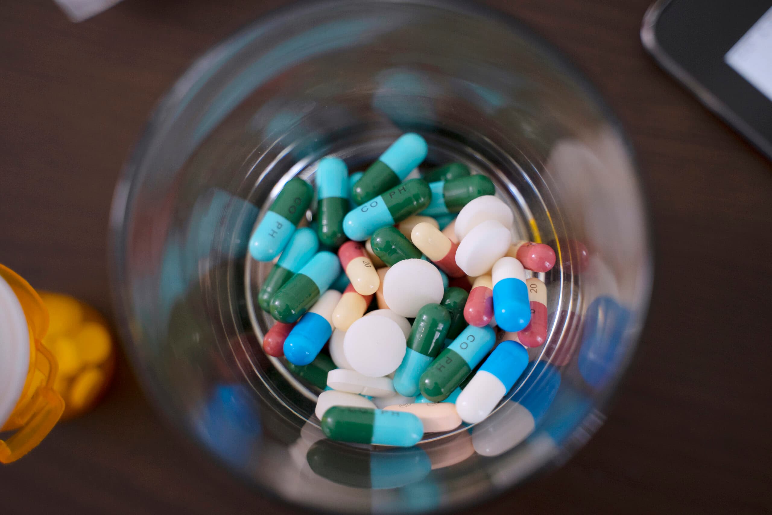 multicolor pills capsules in jar