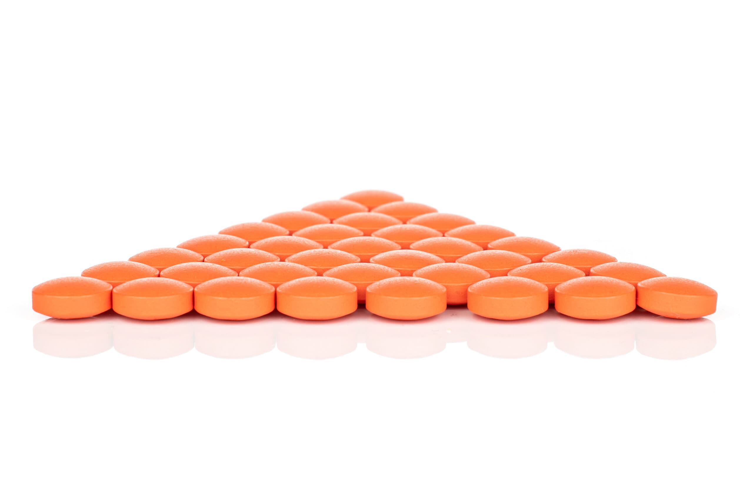 orange pills in triangle shape