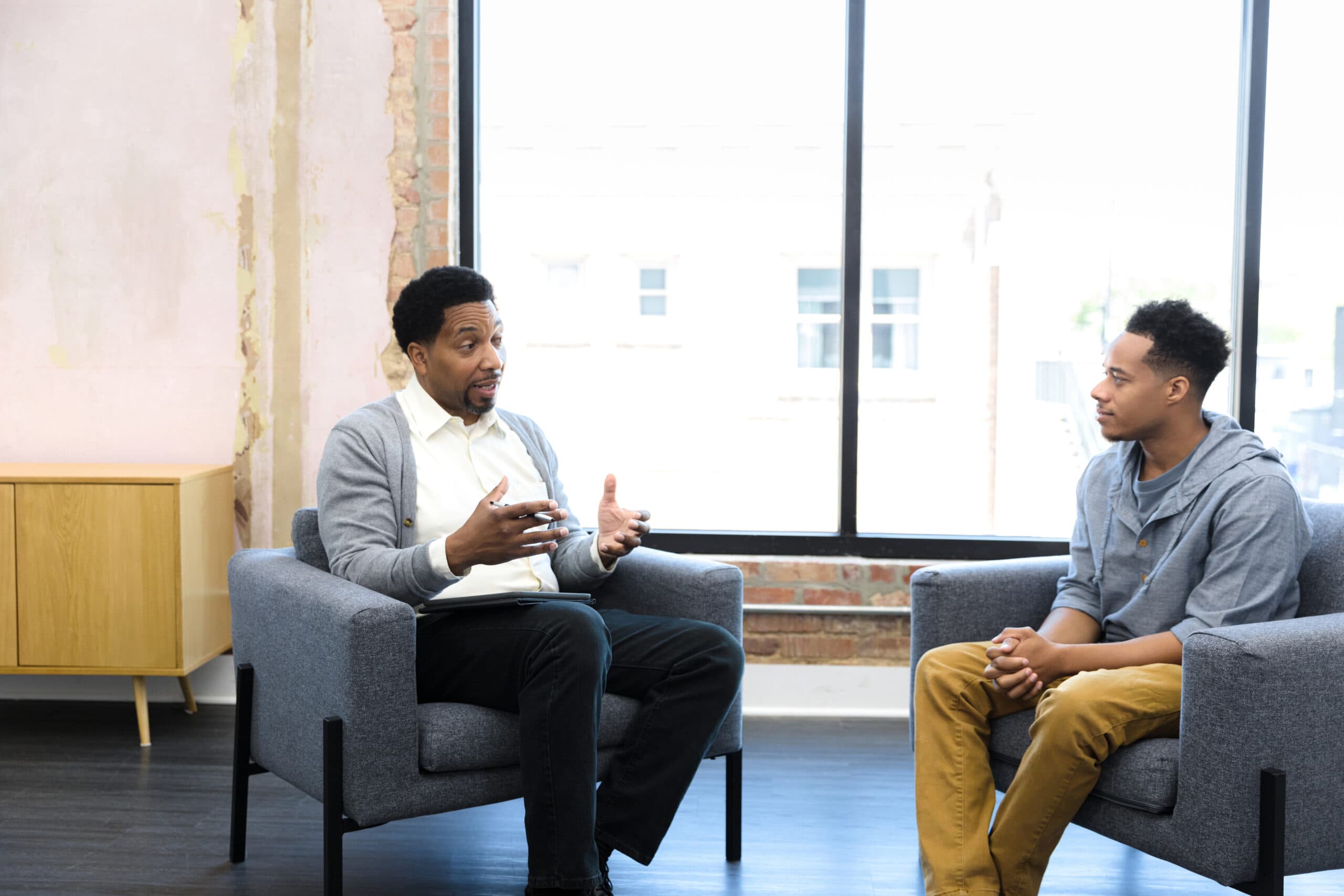 therapist and patient sitting talking