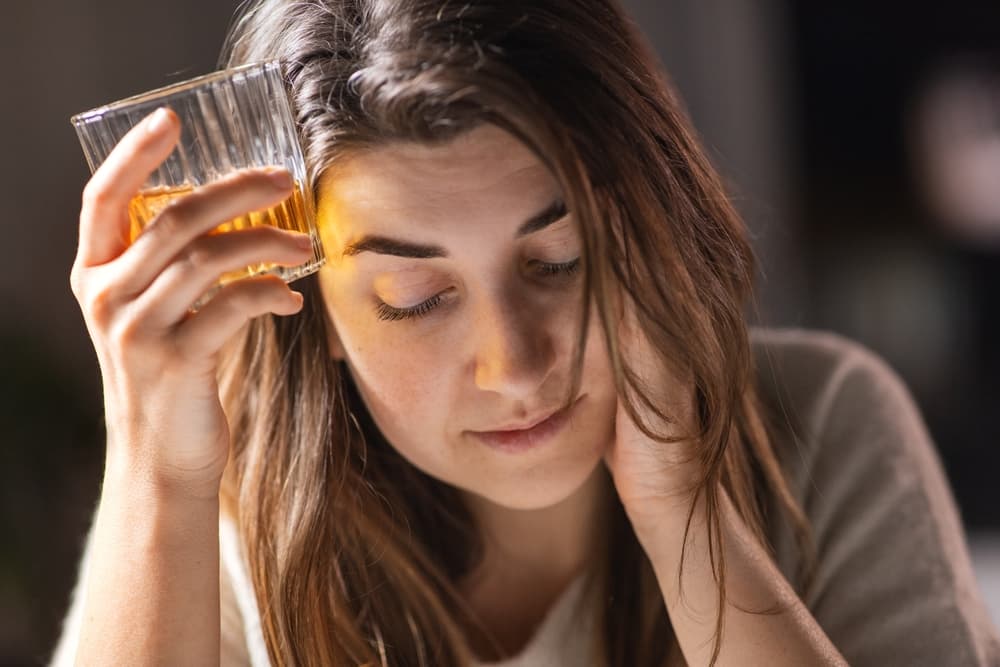 woman alcoholic with drink