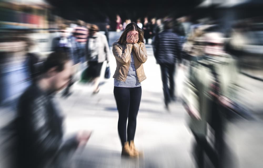 woman having panic attack in public