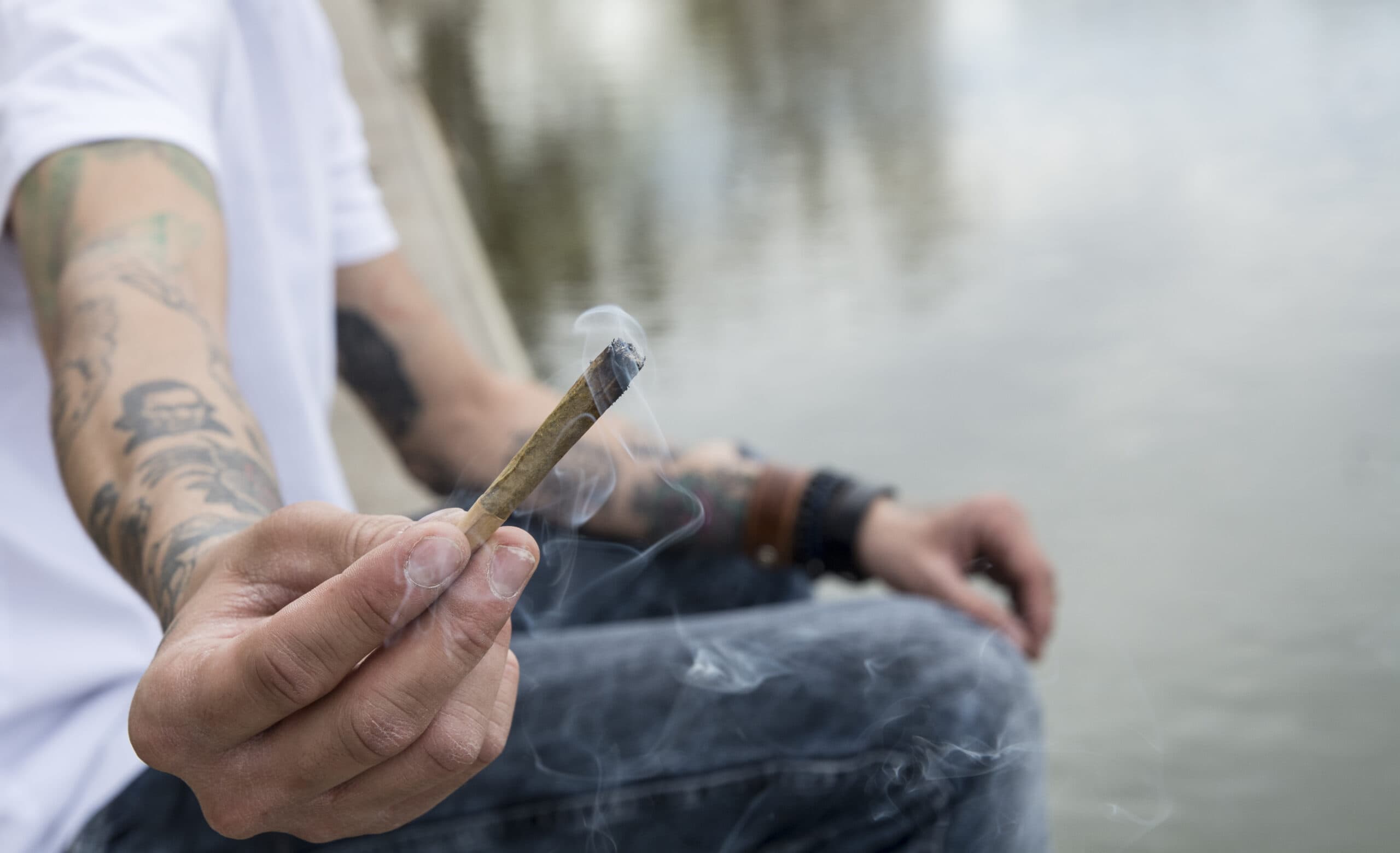 person offering marijuana joint