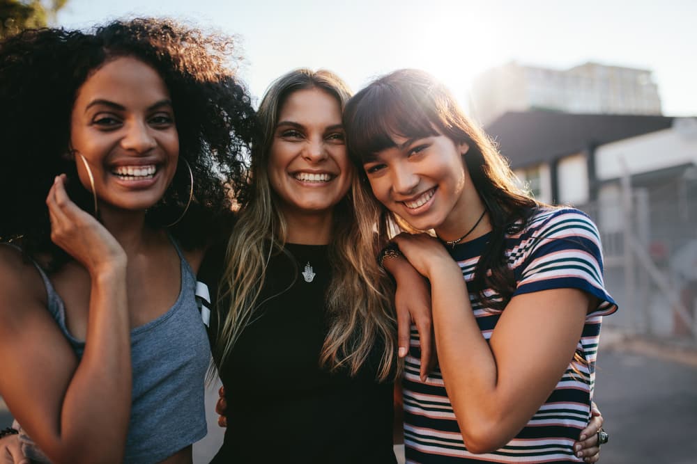 young women outside sober living