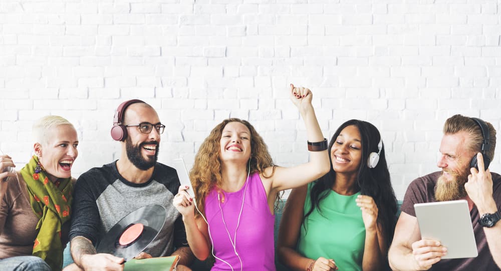 group listening to music dancing