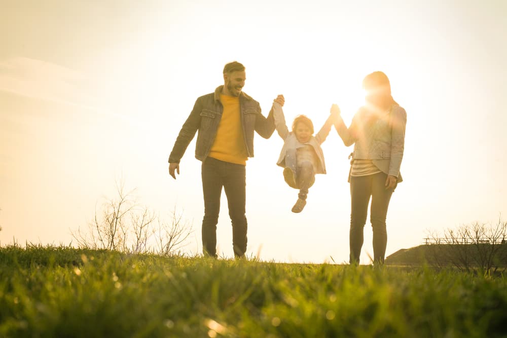 parents playing with kid