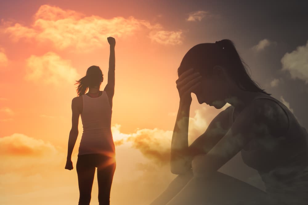 Young woman feeling happy and free overcoming mental fears