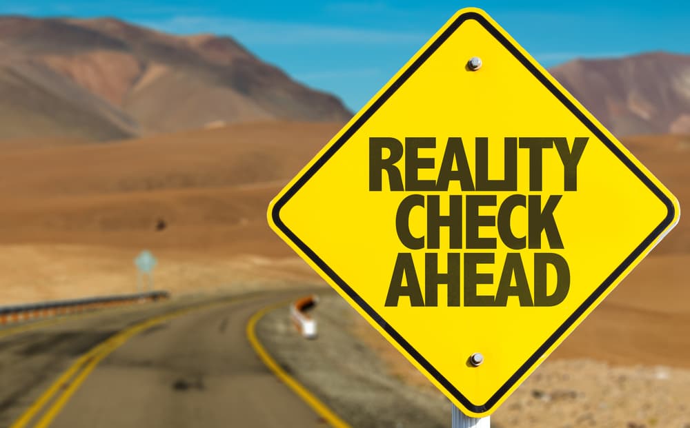 reality check ahead sign