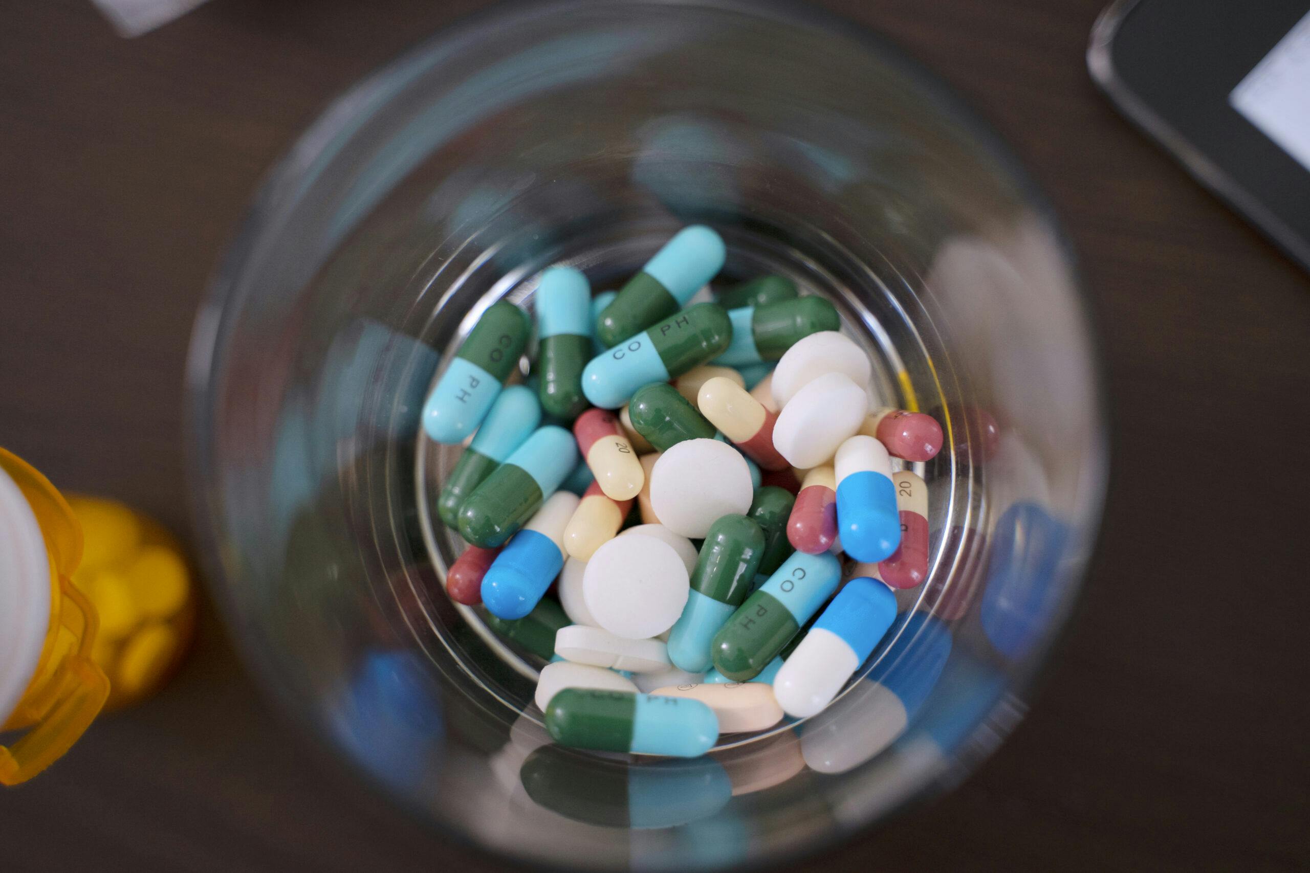 multicolor pills capsules in jar