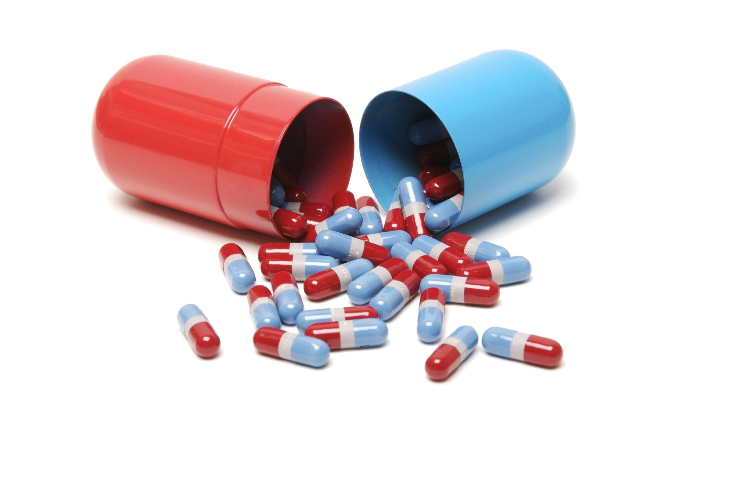 red and blue capsule pills