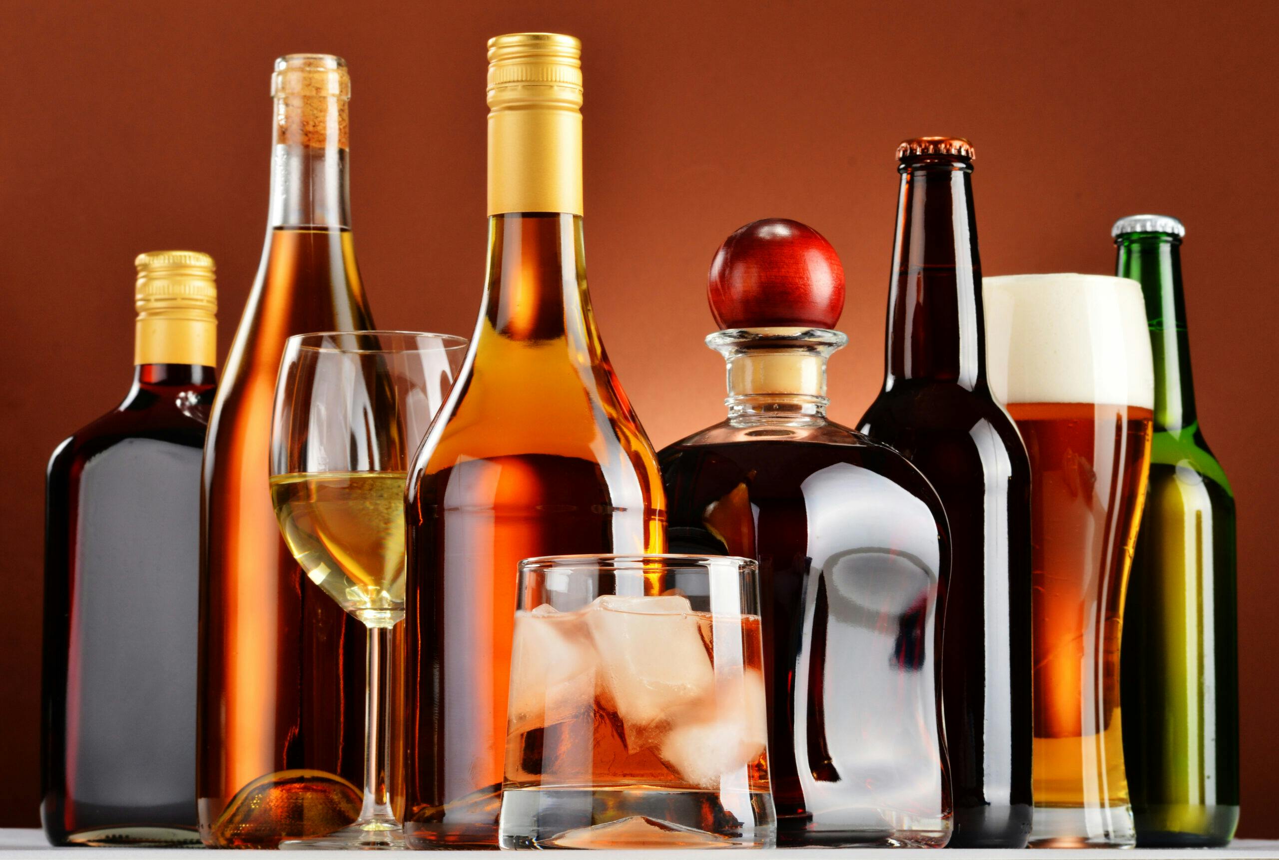 bottles and glasses of liquor wine beer