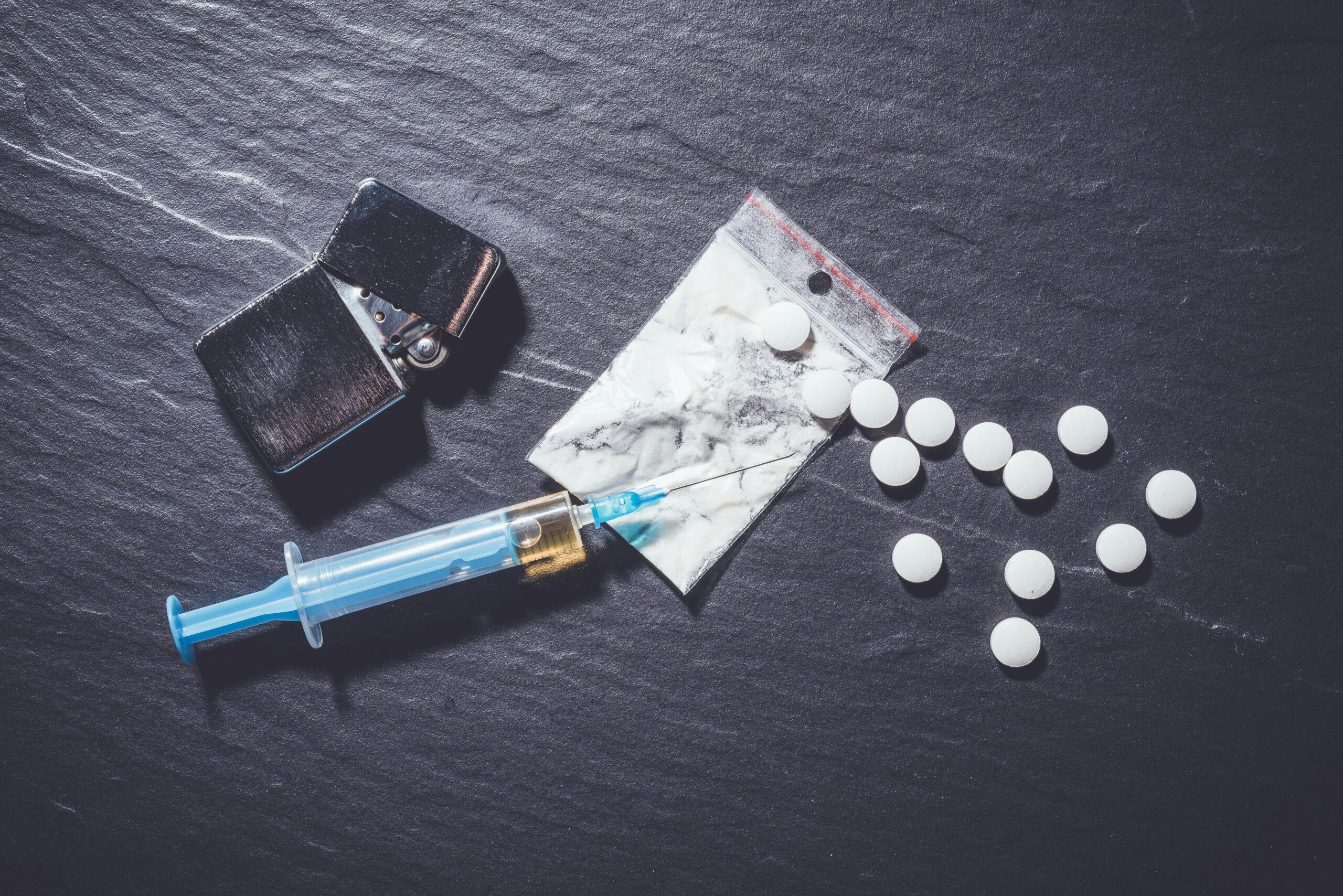 needle powder pills drugs lighter