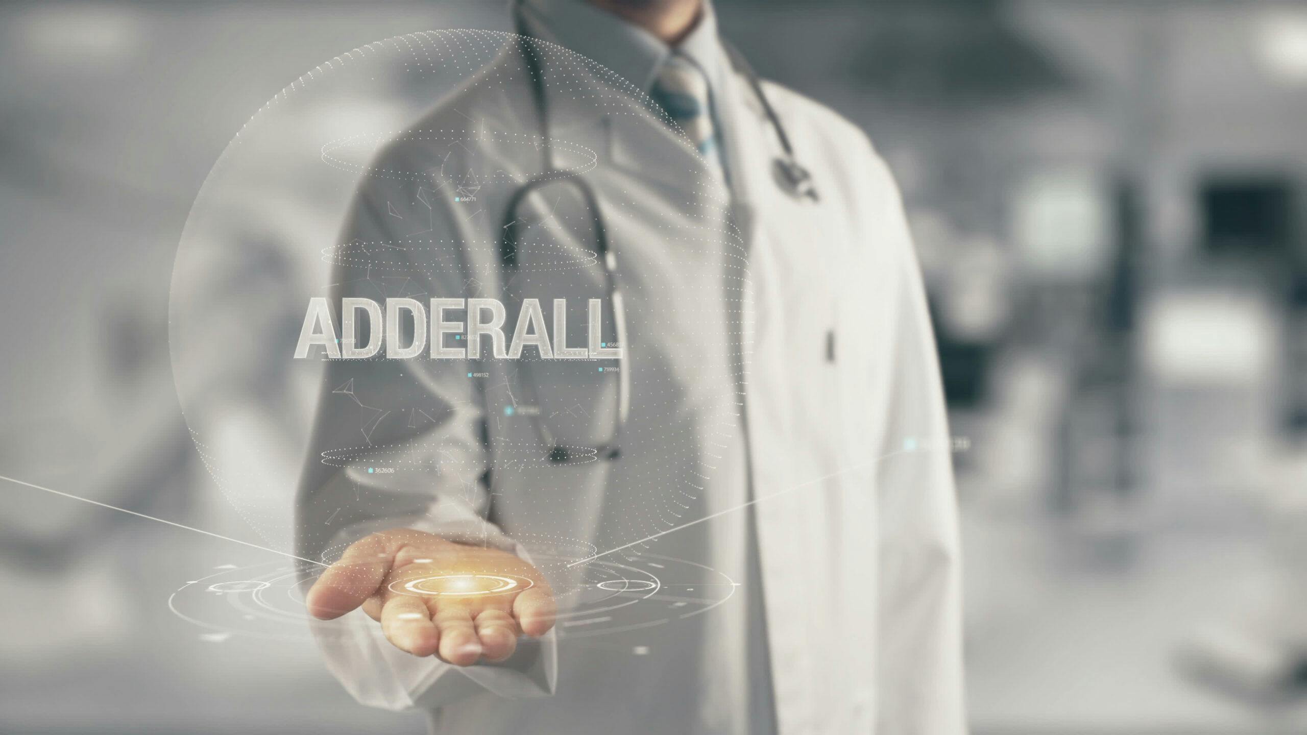 doctor holding adderall pill