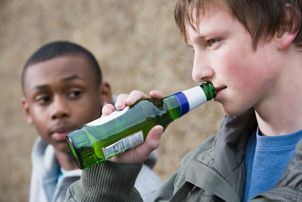 teenage boys drinking beer