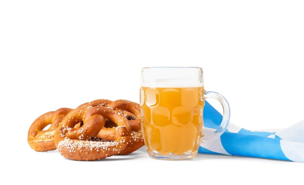 mug of beer with soft pretzels