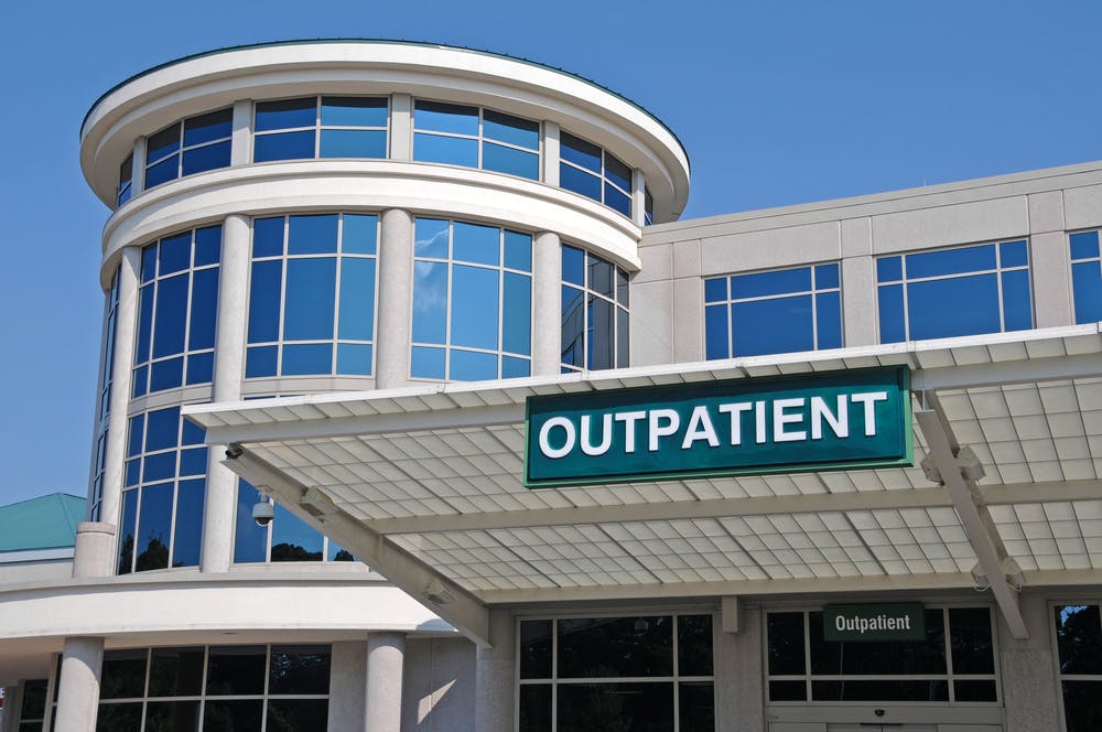 outpatient sign on building