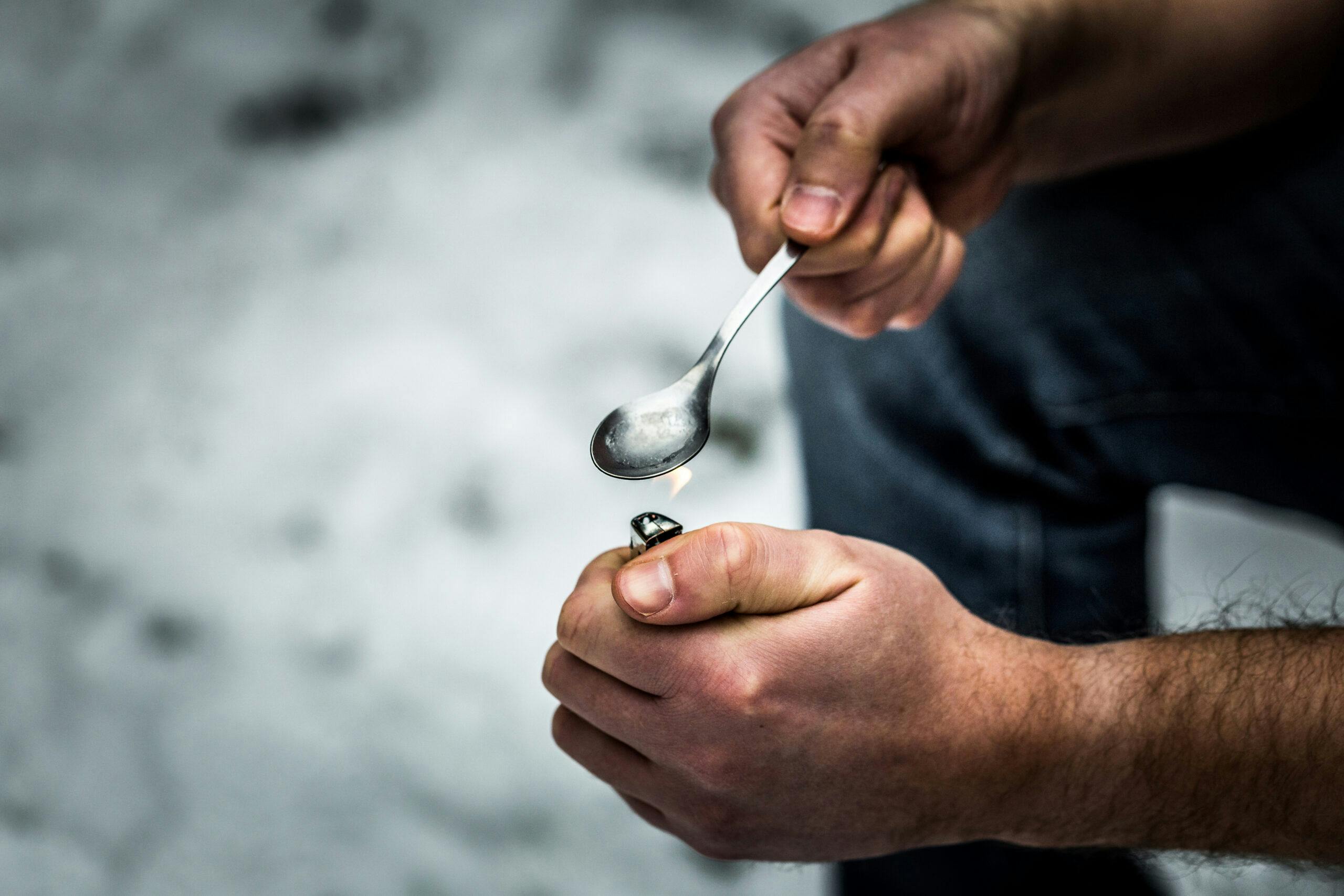 heroin addict spoon lighter
