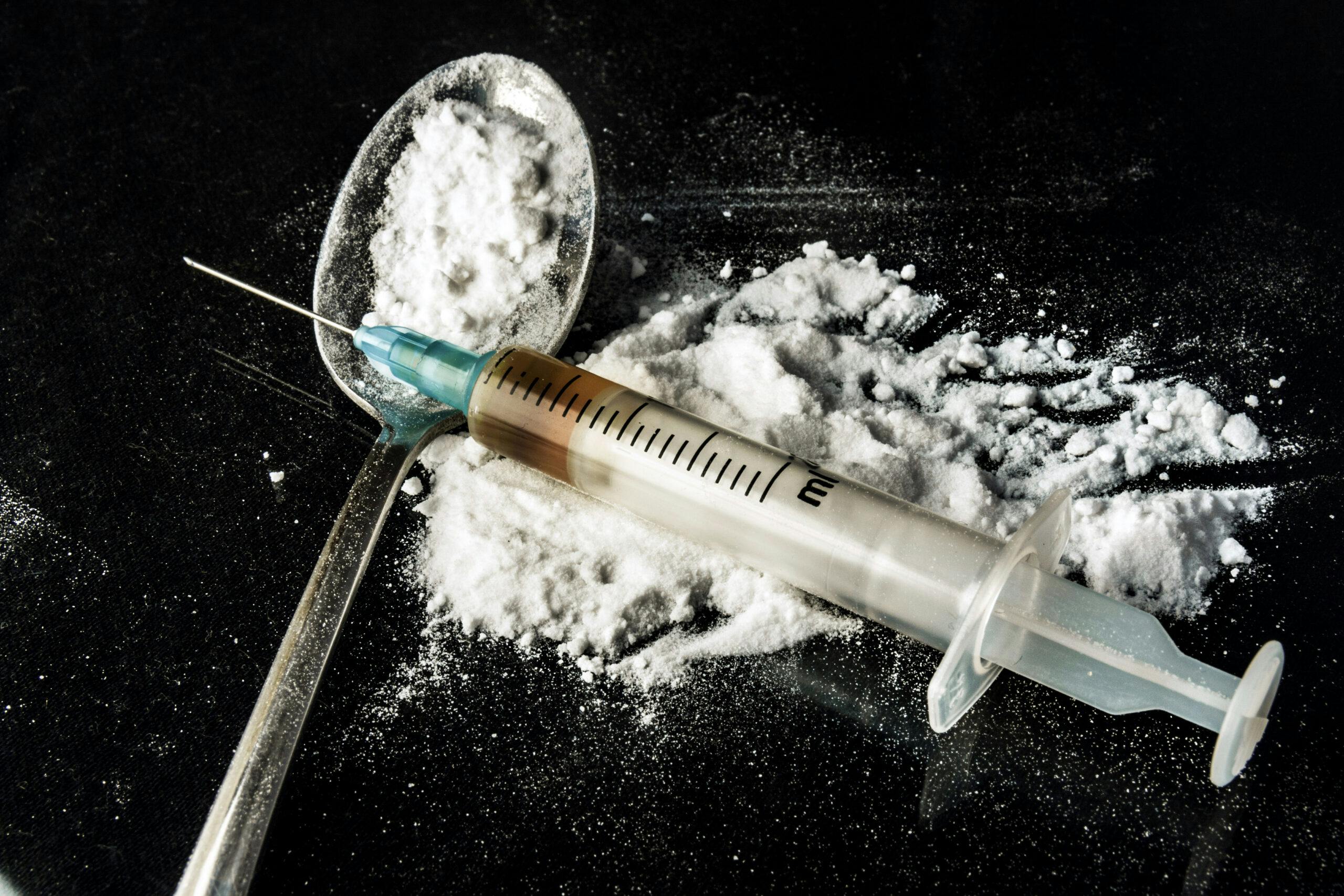 heroin with spoon syringe