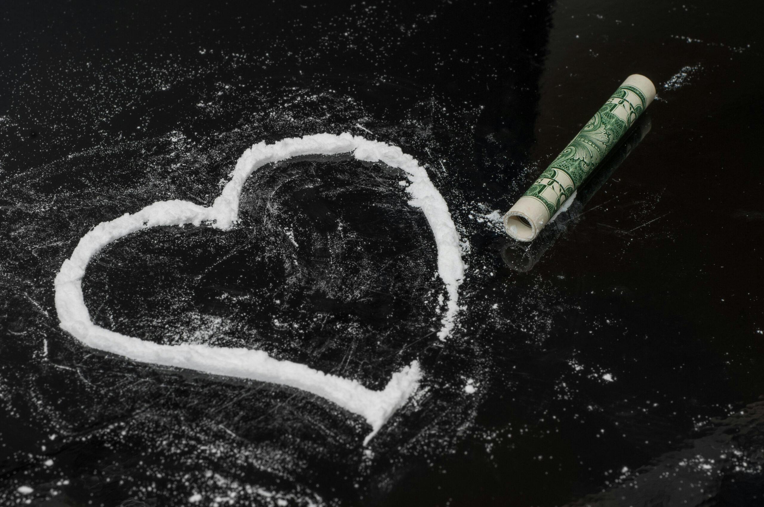 cocaine line heart with dollar bill