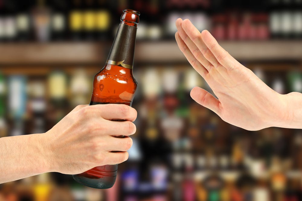 hand refusing beer