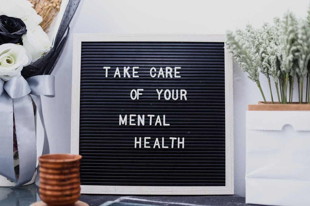 Letterboard with the words, Take care of your mental health.