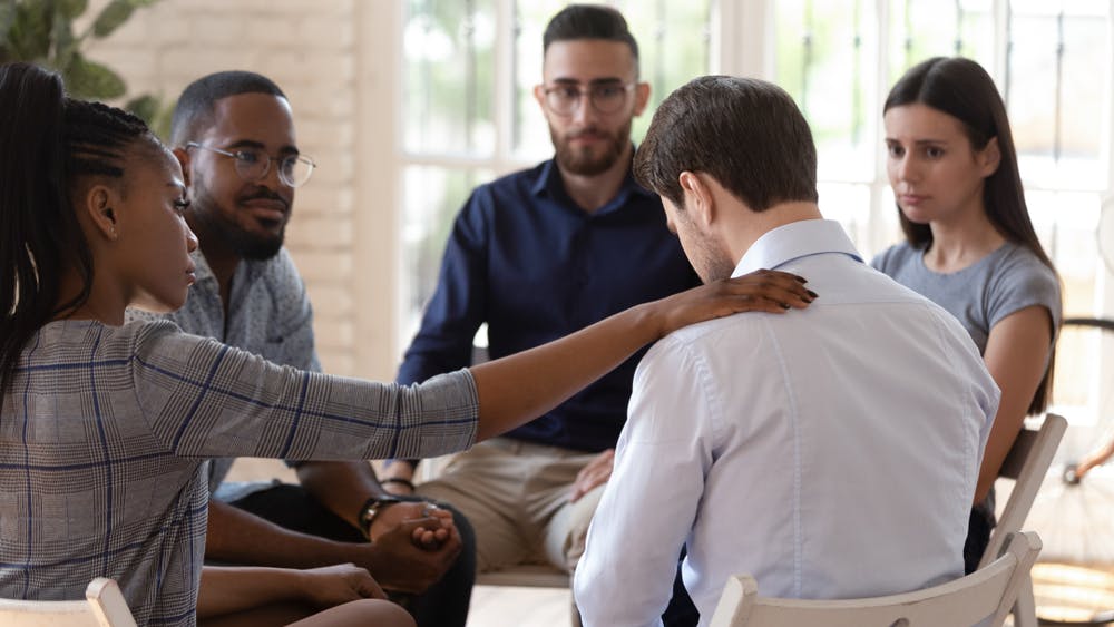 diverse people friend group help patient during therapy counseling session